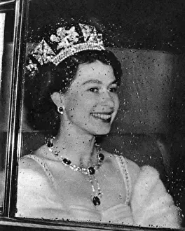 41st Prints: The Queen drives through rain to the House of Lords