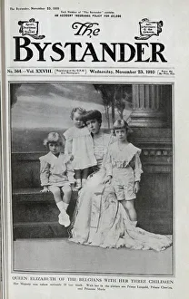 Queen Elizabeth of Belgium, with her three children, Prince Leopold, Prince Charles, and Princess Marie, formal studio portrait on steps by a column. The Queen had been taken seriously ill the previous week