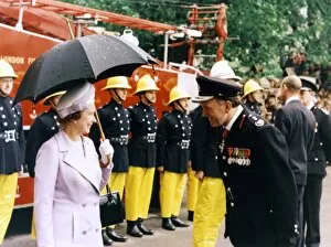 Mauve Gallery: Queen Elizabeth II inspecting firefighters, London
