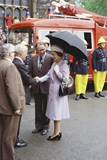 Images Dated 31st May 1977: Queen Elizabeth II inspecting firefighters