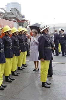 Images Dated 31st May 1977: Queen Elizabeth II inspecting firefighters
