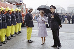 Images Dated 31st May 1977: Queen Elizabeth II inspecting firefighters