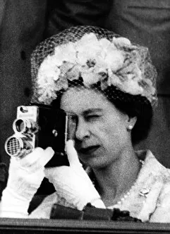 Flowery Collection: Queen Elizabeth II using a cine camera