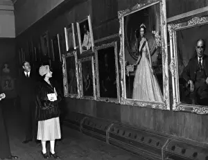 Queen Elizabeth II views her own portrait