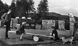 Queen Elizabeth IIs children on a see-saw, 1957 Queen Elizabeth IIs children on a see-saw, 1957