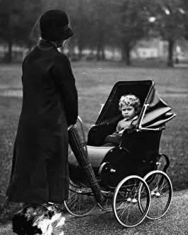 Images Dated 16th December 2011: Queen Elizabeth in her pram aged three