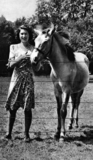Images Dated 14th October 2011: The Queen as a girl with a pony