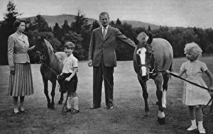 Images Dated 22nd July 2011: The Queen and Prince Philip play with their children, ponies