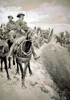 R F A mule-teams pulling limbers over a shell torn track