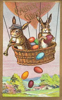 Rabbits in a balloon on an Easter postcard