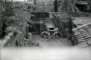 Terraced Collection: Racing Bicyle in the back yard of a terraced suburban house