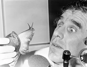Radio presenter with giant snail