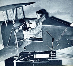 Cadet Collection: RAF cadet learning on a link trainer, WW2