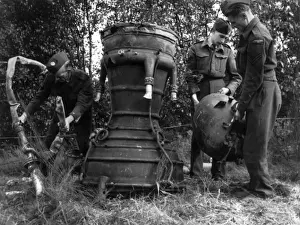 RAF personnel inspect the remains of a V-2