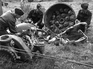 RAF personnel inspect the remains of a V-2
