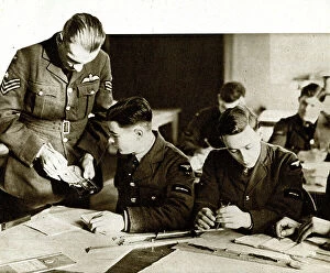 Cadet Collection: RAF trainee pilots working out courses and speeds, WW2