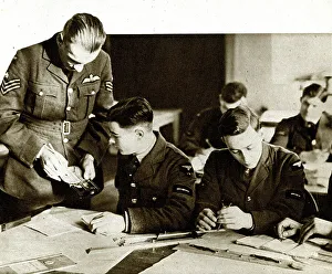 Courses Prints: RAF trainee pilots working out courses and speeds, WW2