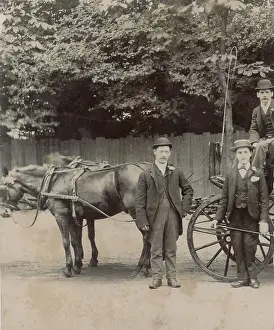 Cabby Prints: Three rather raffish horse- drawn cab drivers pose for a photograph during a quiet moment in between driving jobs