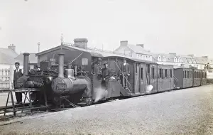 Railway station scene, locomotive