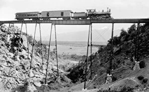 A railway train crossing the high bridge near Buena Vista, C