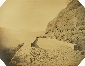 Railway viaduct and retaining walls on rock escarpment