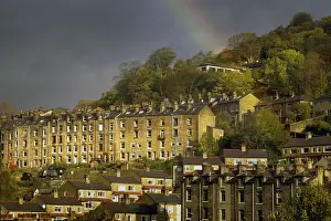 1988 Prints: A rainbow over terraced stone houses at Hebden Bridge