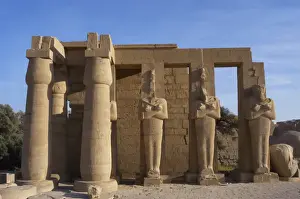 Rameseum. Pillars with osirian statues. Egypt
