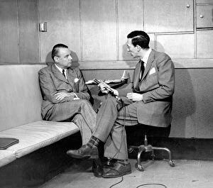 Airlines Collection: Raymond Baxter conducting an interview with an American Airl