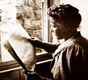 Reading the Daily Mail Newspaper