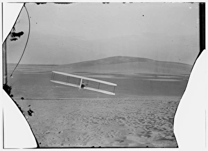 Rear view of Wilbur making a right turn in glide from No. 2 Rear view of Wilbur making a right turn in glide from No. 2