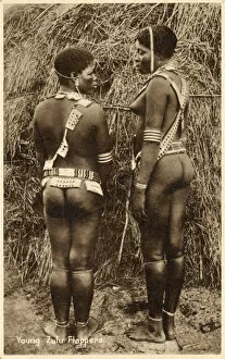 Rear view of two young Zulu Women, South Africa