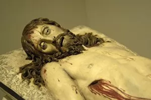 Geografia Gallery: Reclining Christ. Polychrome sculpture by Gregorio