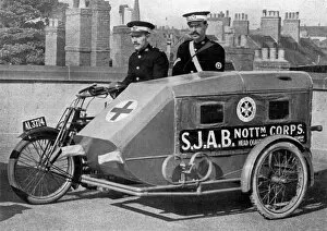 Ambulances Gallery: A Red Cross Ambulance with motor-cycle attached