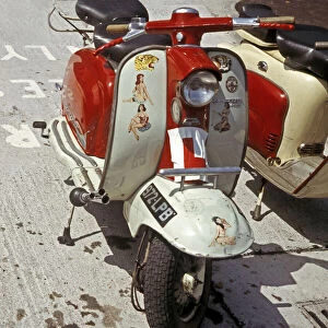 Images Dated 27th April 2021: Red and white Lambretta with stickers