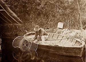 Reed boathouse and eel fisherman in East Anglia