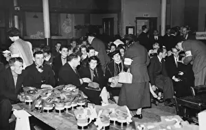 Distributing Prints: Refugee waiting room WWII