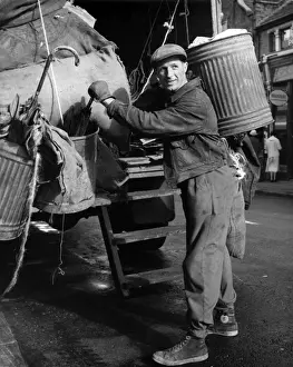 Refuse collector at work on a Balham street, SW London