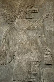 Cuneiform Gallery: Relief depicting a eagle-headed protective spirit. Nimrud