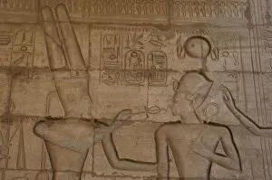 Amun Gallery: Relief depicting god Amun giving the ankh to the Pharaoh Ram
