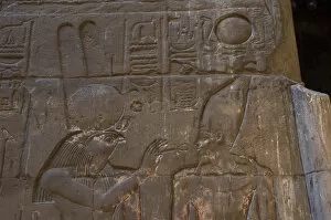 Crux Collection: Relief depicting the god Monthu offering the ankh to the ph