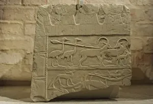Relief depicting a hunting scene with ostrichs and ibexes. E