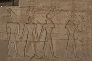 Relief depicting a Pharaoh Ramses II with different gods. Ra Relief depicting a Pharaoh Ramses II with different gods. Ra