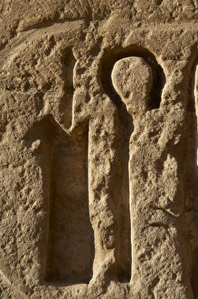 Relief with hieroglyphic symbols. Crook. Temple of Ramses II Relief with hieroglyphic symbols. Crook. Temple of Ramses II