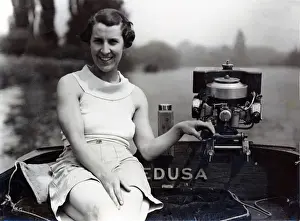 Tiller Prints: Rene Fraser at the helm of the tender to Medusa