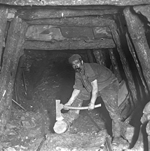 Prop Collection: Repairing pit props, Plas y Coed Level, South Wales