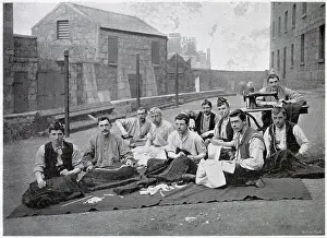 Representing the tailors of the regiment making kilts for the Gordon Highlanders in the barrack-yard at Aberdeen. Date: circa 1902