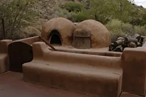Petroglyph Prints: Reproduction of an old adobe ovens for making bread. Petrogl