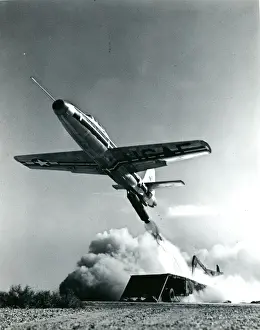 A Republic F-84 Thunderjet is launched from a Martin Air?