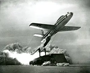 Launcher Prints: A Republic F-84 Thunderjet is launched from a Martin Air?