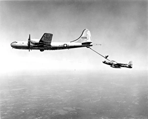 Boeing Collection: Republic F-84G Thunderjet, 51-767, takes on fuel from a ?